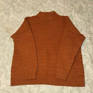 Orange knit sweater